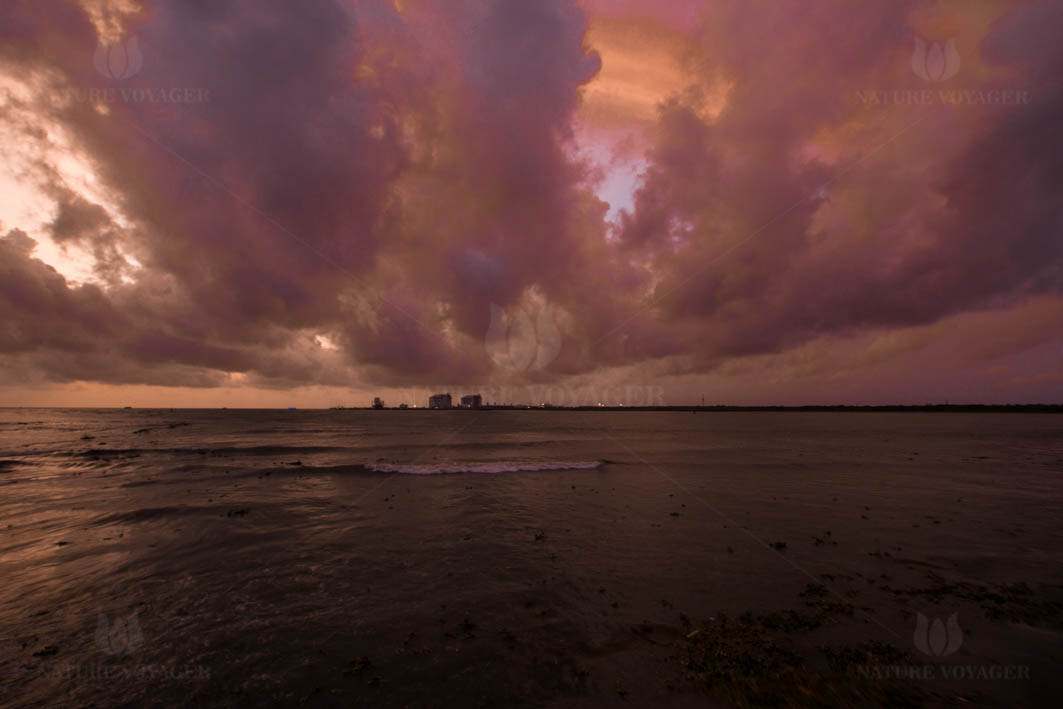 RAIN CLOUDS OVER SEA SIDE CITY